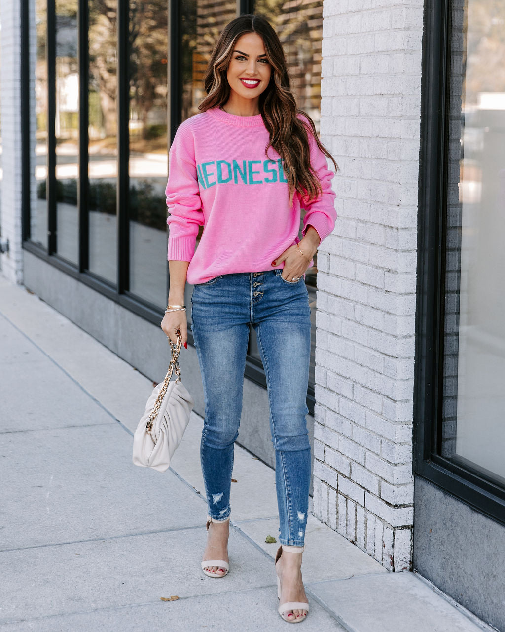 Wednesday Wearing Pink Knit Sweater